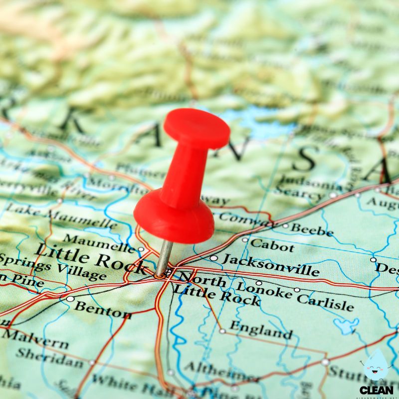 Map of Arkansas with a pin sticking in it
