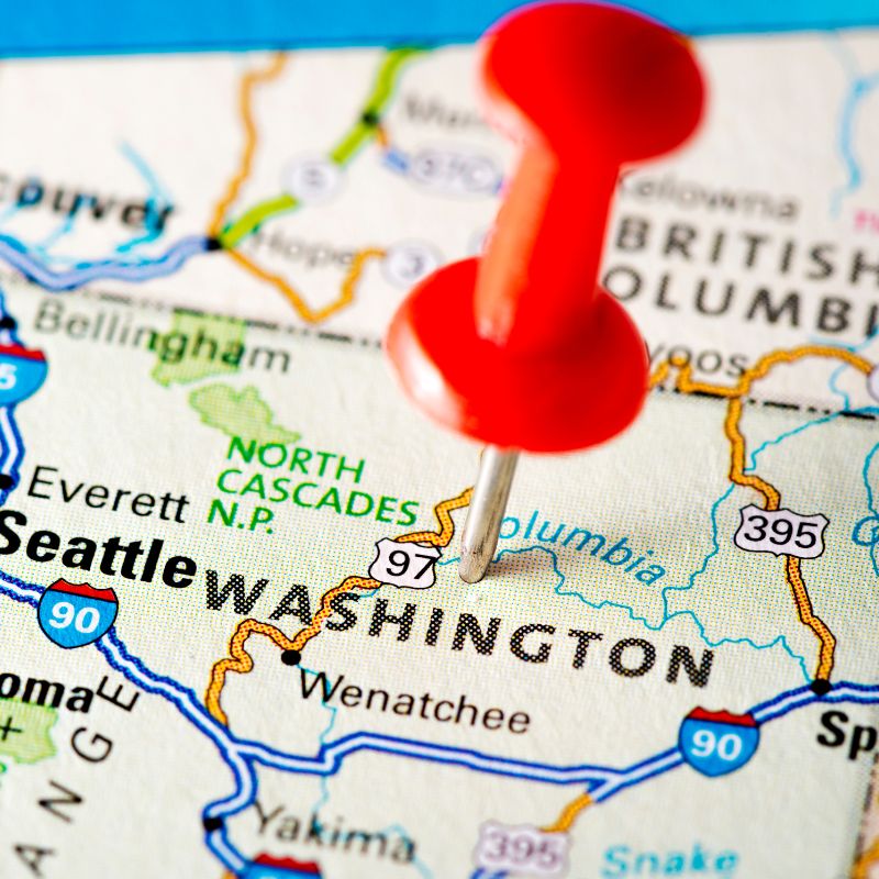 State map with a pin in it